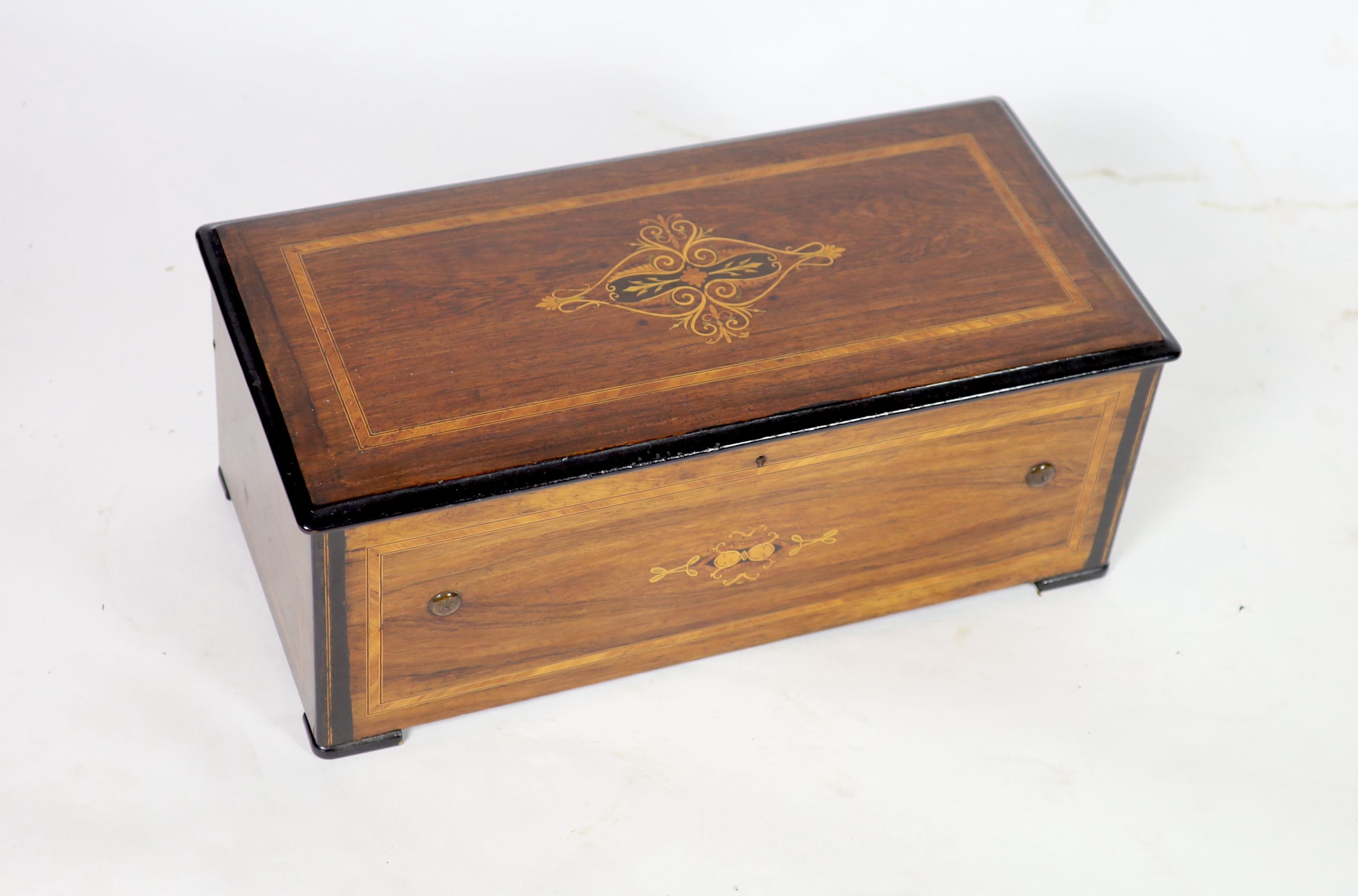 A late 19th century Swiss marquetry inlaid rosewood ten air musical box, width 67cm depth 32cm height 26cm